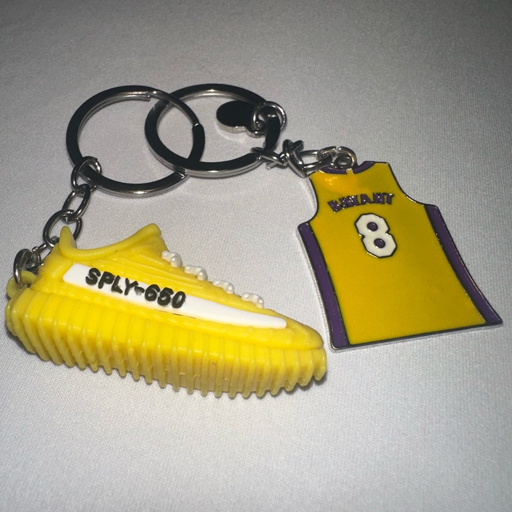 Yeezy shoe and Kobe Bryant jersey keychain